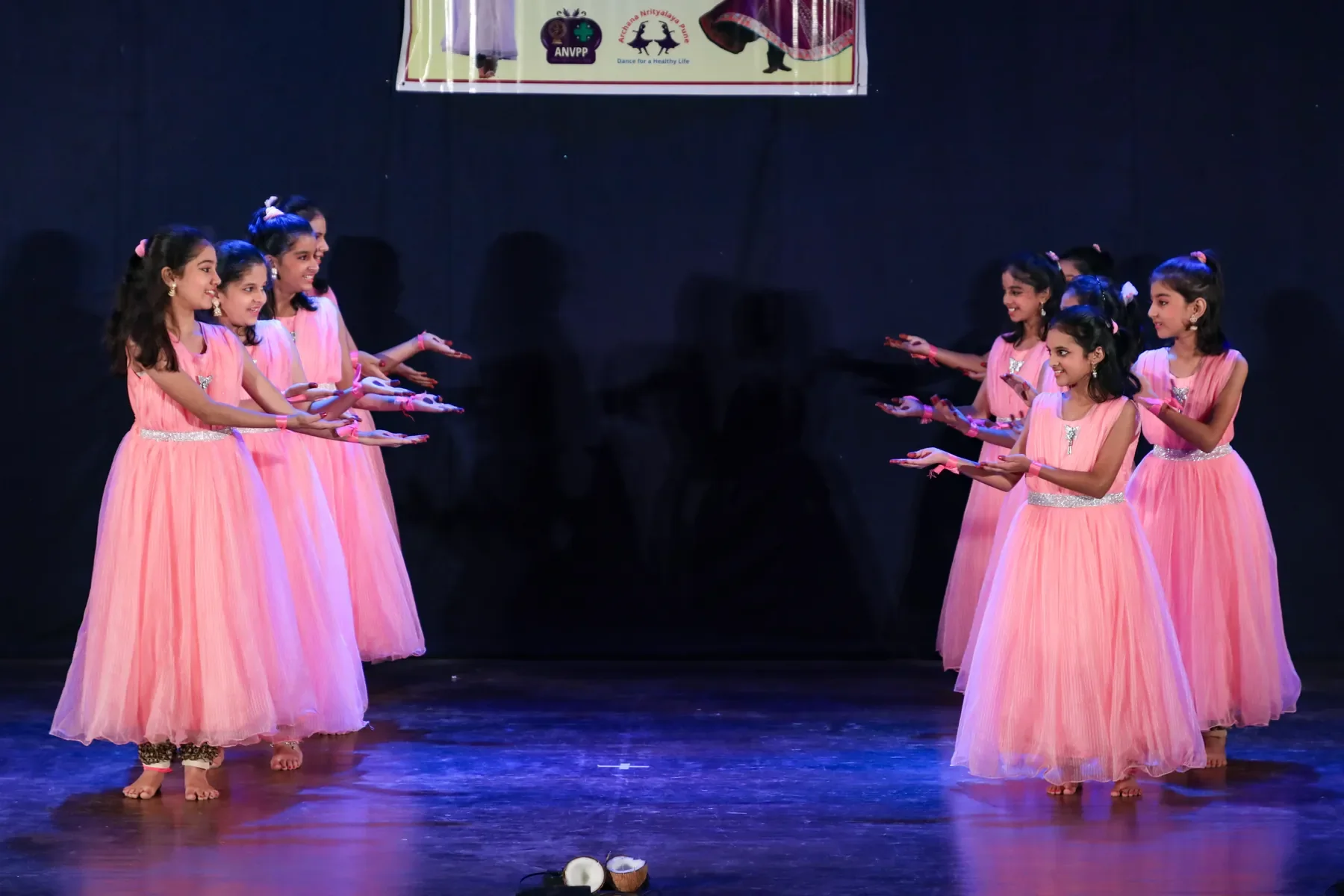 The youngest Kathak students of Archana Nrityalaya performing together in pink at the annual gathering in Pune