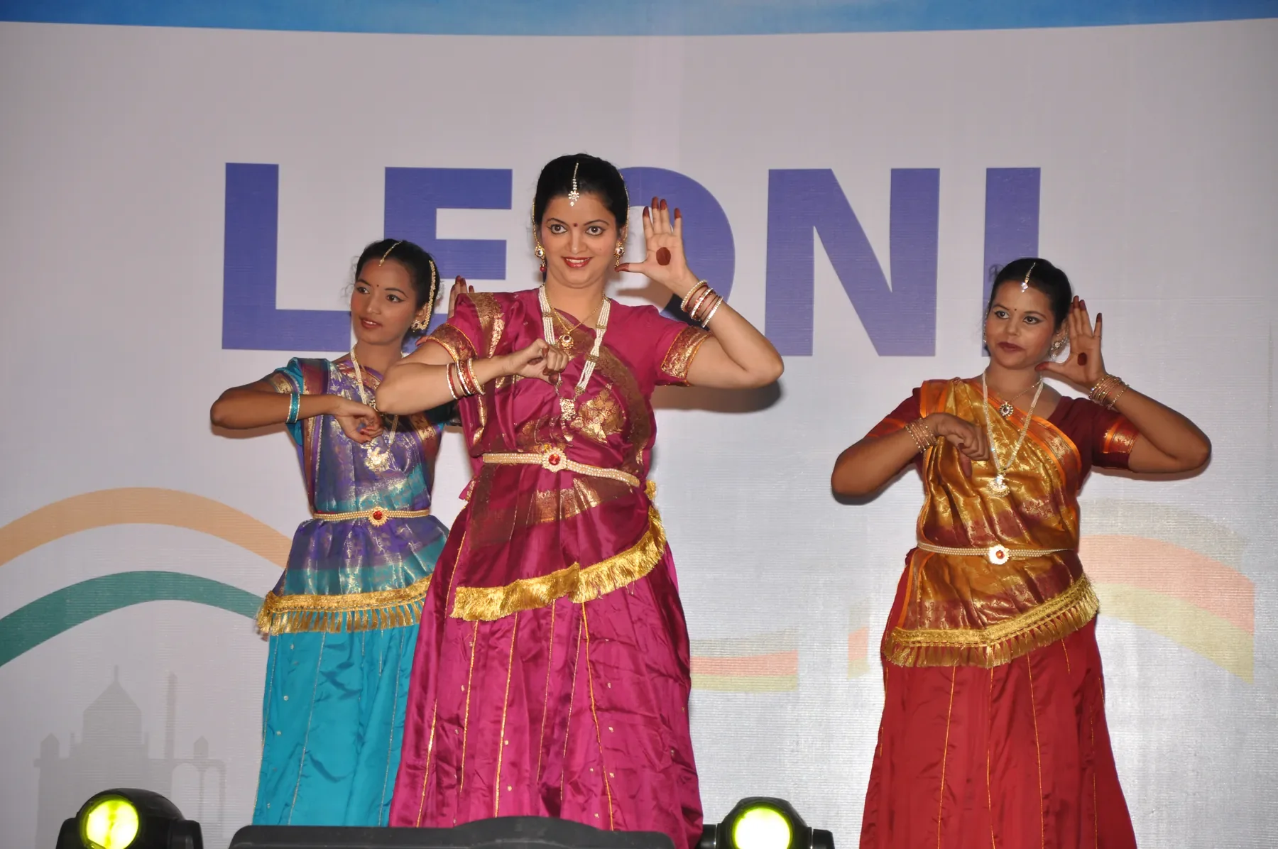 Three dancers of Archana Nrityalaya Pune performing Kathak at a corporate event in Pune